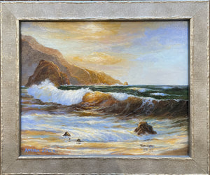 This lovely oil painting is of an oceanscape with  sunset in Kauai .  There are waves rolling  onto the shore and there are mountains on the left side of the painting.  The sunset is reflecting an orange glow onto the clouds, waves and shore.  There are a couple small rocks on the shoreline.  The predominant colors are shades of orange and rust with browns, greens and blues.