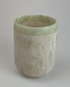 Upright straight sided vessel of white Colorado alabaster with a soft green talc rim