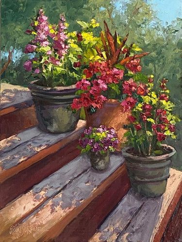 Potted flowers on rustic warm redwood toned steps. Rose, reds, purple toned flowers.