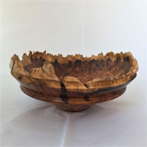 Natural edge vessel of amboyna wood