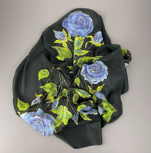 Load image into Gallery viewer, Soft blue-purple roses with fresh green leaves hand-painted on black silk scarf/wrap
