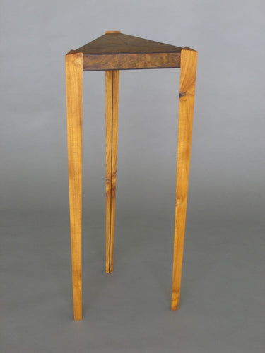 Laurel burl triangle table with triangular teak legs and wenge inlay details in the top and on legs